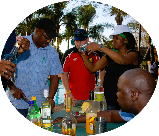 team making cocktails